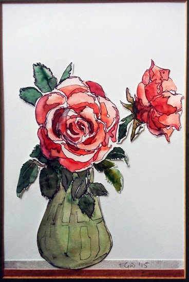 two red roses in a green vase