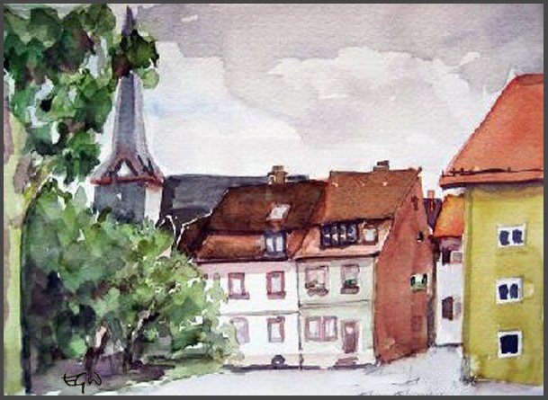 Houses in Neckargemund and church spire with trees